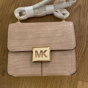 Michael Kors brand new.  Sonia crocodile faux pink bag